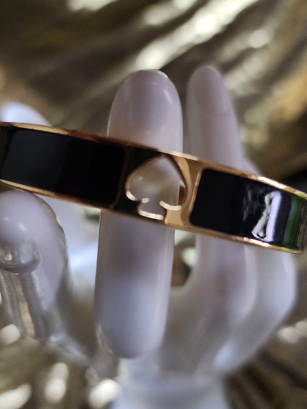 Kate Spade Black Enamel and Gold-Tone Spade Bangle Bracelet.